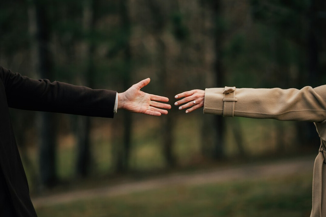successful business handshake outdoors