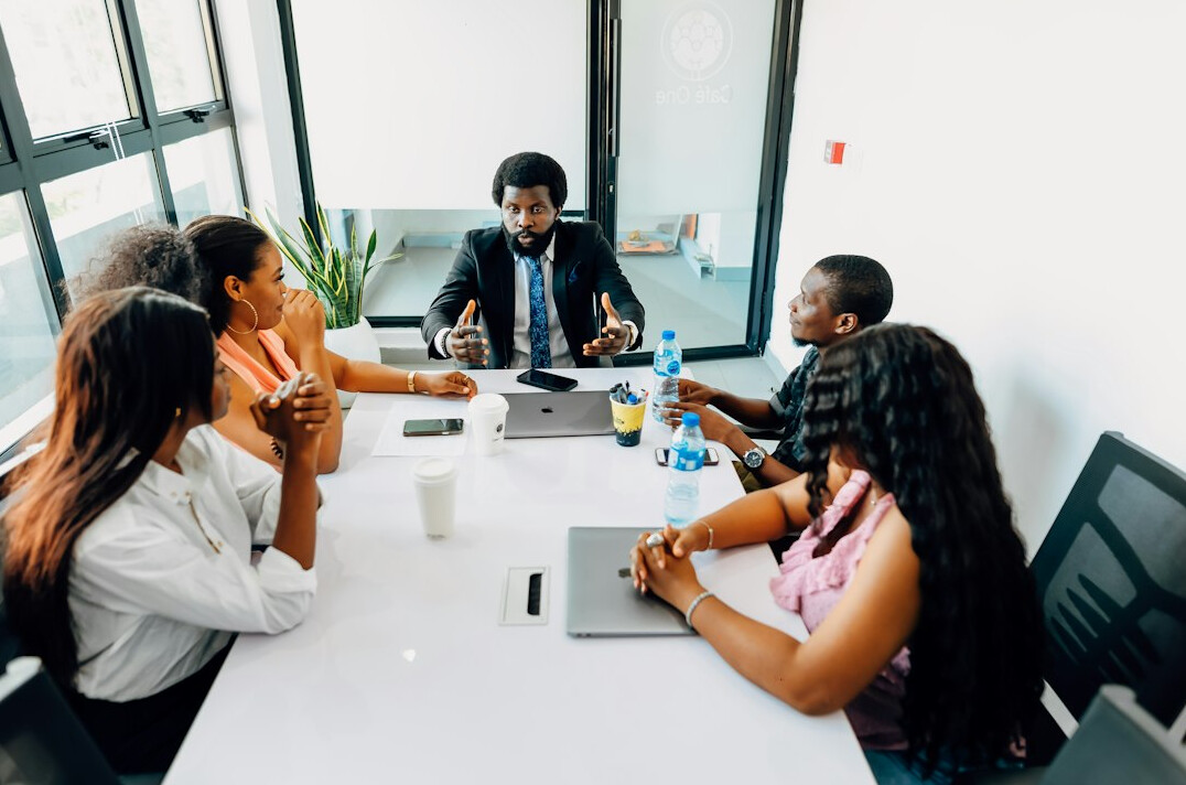 business people negotiating in meeting room