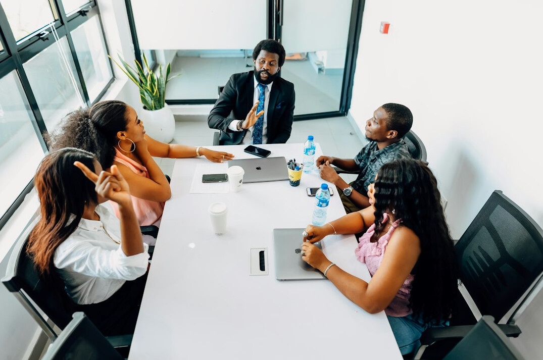 business people negotiating in meeting room